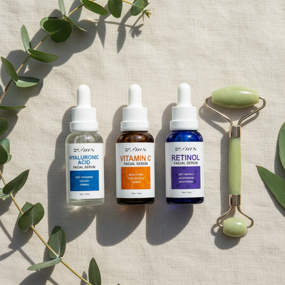 Serums flat lay with eucalyptus and linen